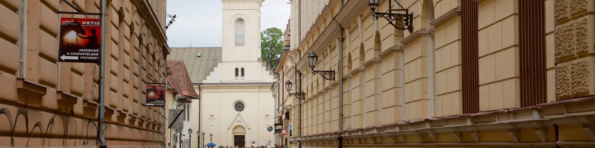 Kosice which includes a church or cathedral and street scenes
