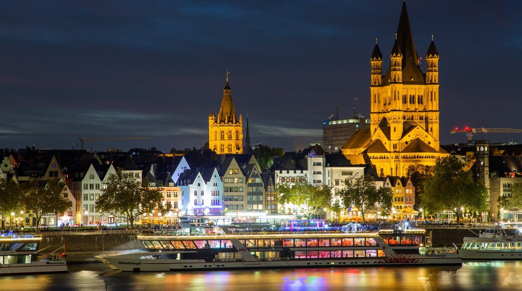 Cologne which includes a river or creek, night scenes and a city