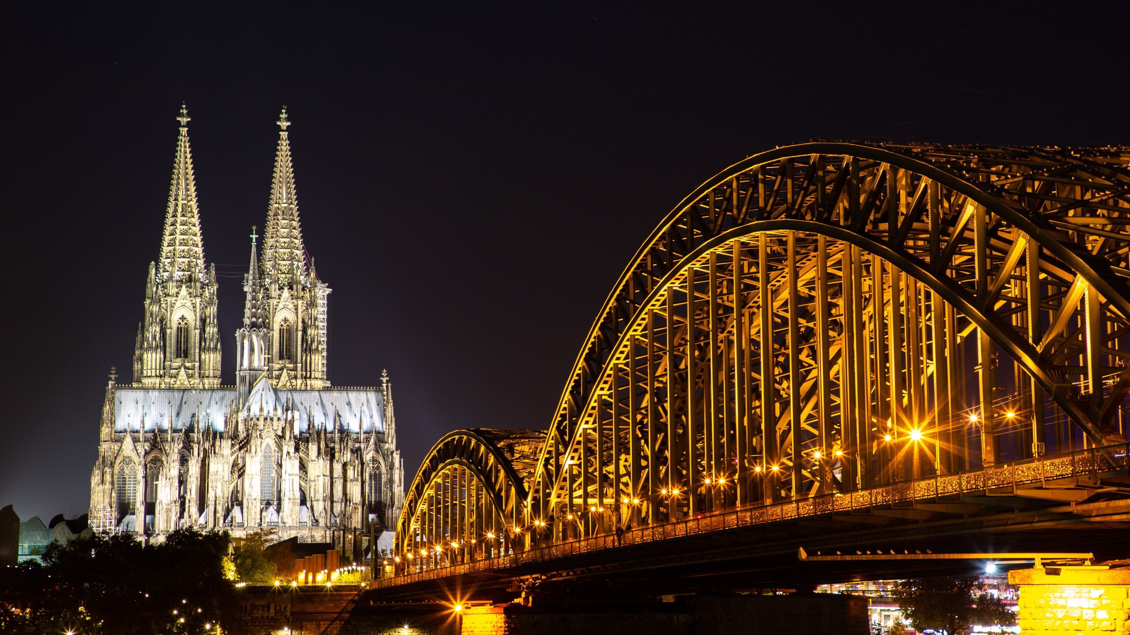Cologne showing a bridge, heritage architecture and a church or cathedral