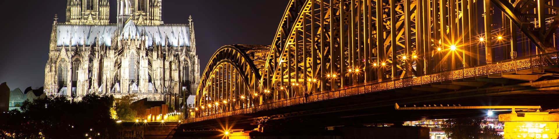 Cologne showing a bridge, heritage architecture and a church or cathedral