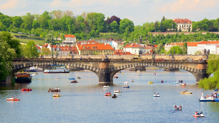 Prague showing a bridge, a river or creek and a city