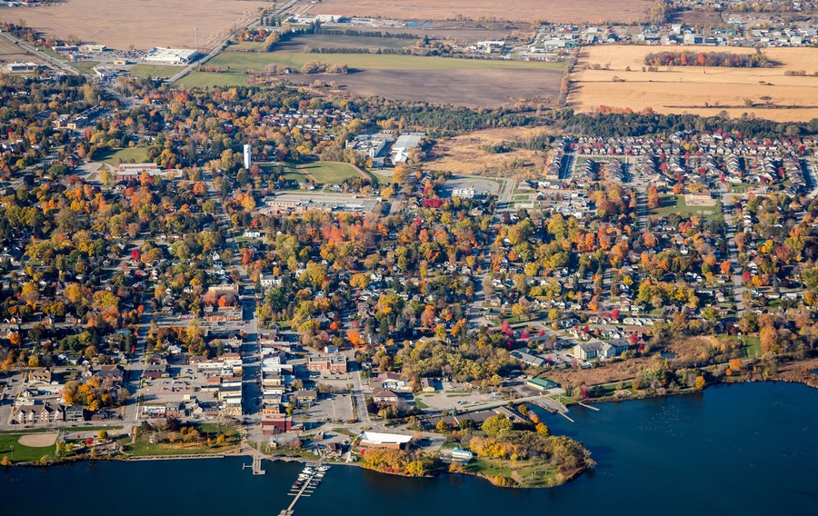 An aerial view of downtown Port Perry, a small town in Ontario, Canada. A view from the east showing waterfront on Lake Scugog.