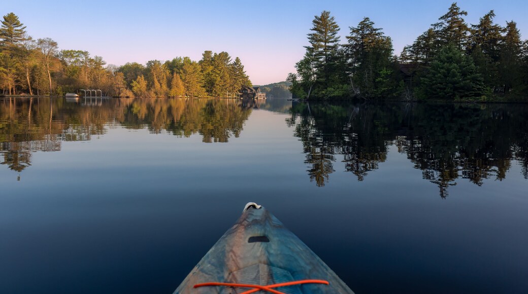 Springtime kayaking along the shores of Joseph Lake in the Muskokas of Ontario, Canada