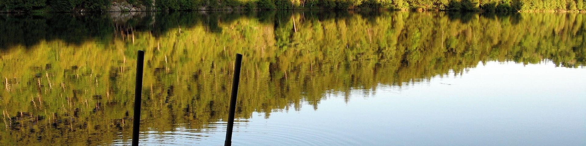 Renting a cottage on Calabogie Lake in Ontario is a great way to wind down and relax. Take a swim, go fishing, canoeing or kayaking, be one with nature. #ontario #canada #AquaTrove