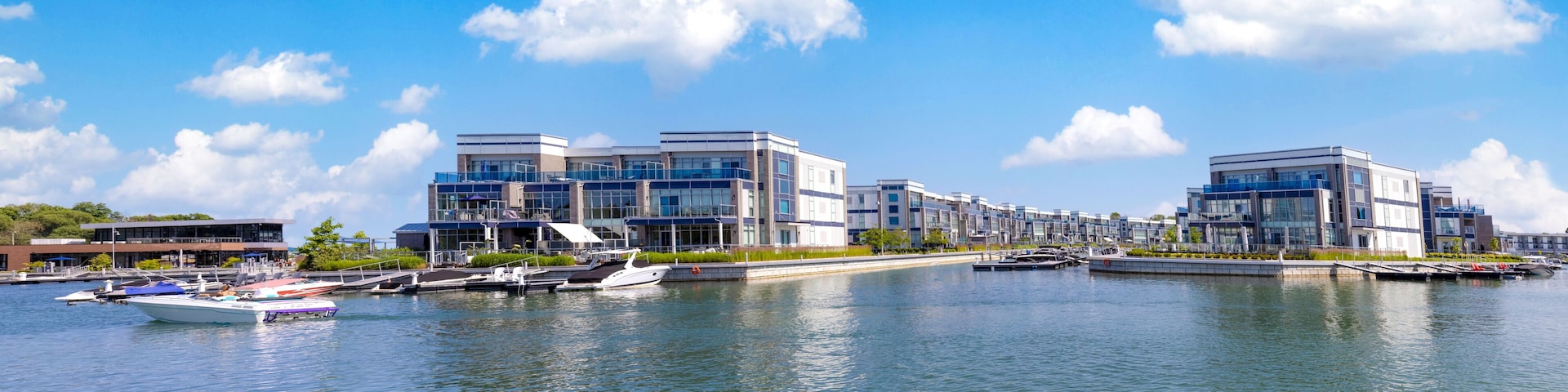 Scenic Innisfil marina and yacht club on Ontario Lake Simcoe with hotels and boat rentals.