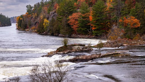 French River Rough Rapid Water Cascades of the Recollet Falls. Gray Stormy Autumn Day at French River in Killarney, Ontario, Canada