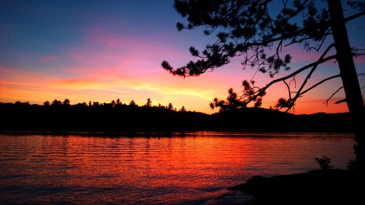 I spend a lot of my weekends in the summer camping near home in Ontario or Quebec. I took this photo last weekend on my first trip of the year and wasn't disappointed with the spectacular sunsets that often occur. What made it even better was listening to the loons calling as the sun went down.
