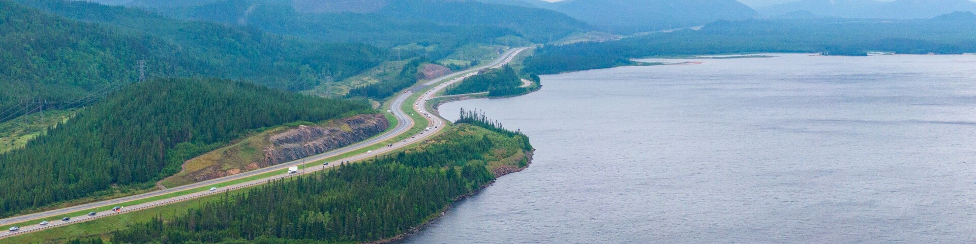 Lac-Jacques-Cartier featuring landscape views, mist or fog and tranquil scenes