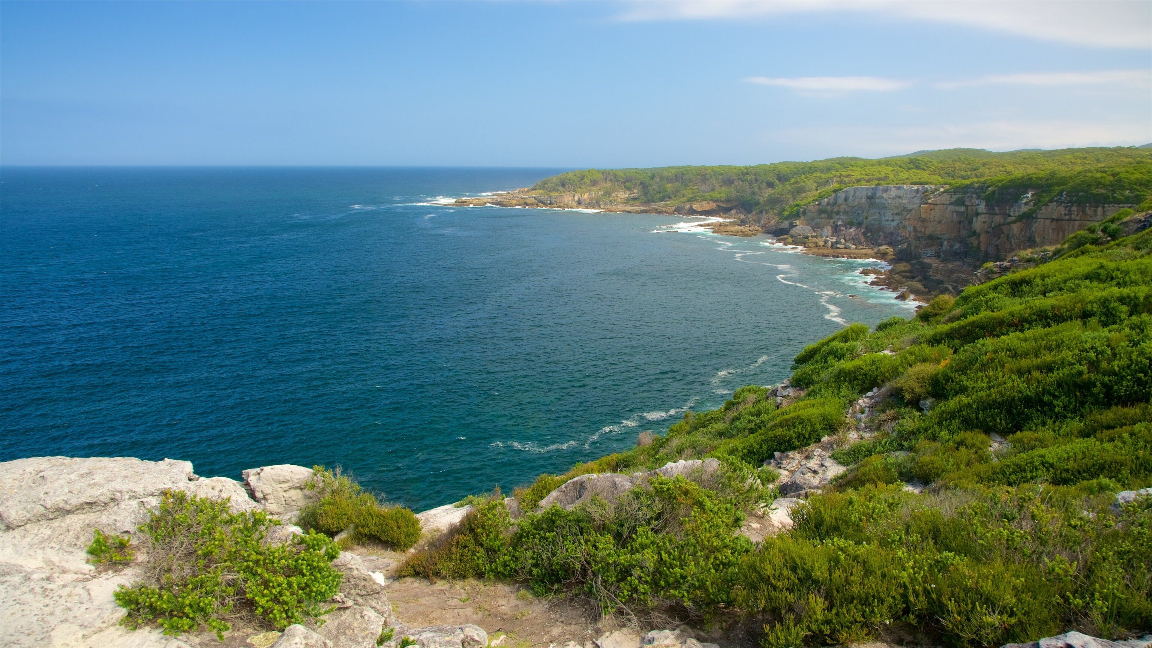 Sanctuary Point qui includes côte rocheuse et vagues