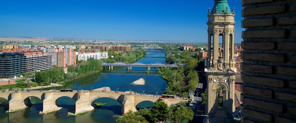 Puente Piedra featuring heritage architecture, landscape views and a river or creek