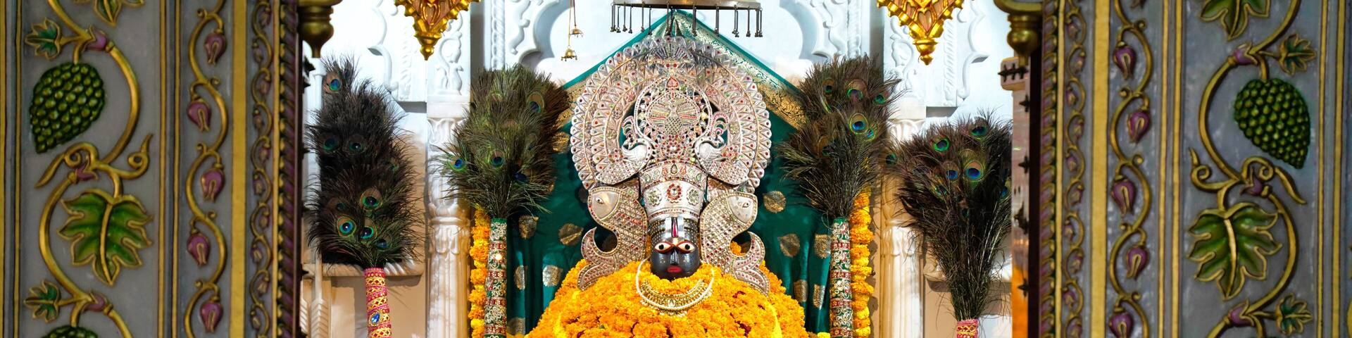 Lord Khatu Shyam ji Baba, form of Lord Krishna decorated with colorful garlands in Khatu. Shyam is a name and manifestation of Barbareek, grandson of Bhim and Hidimba in Mahabharata.