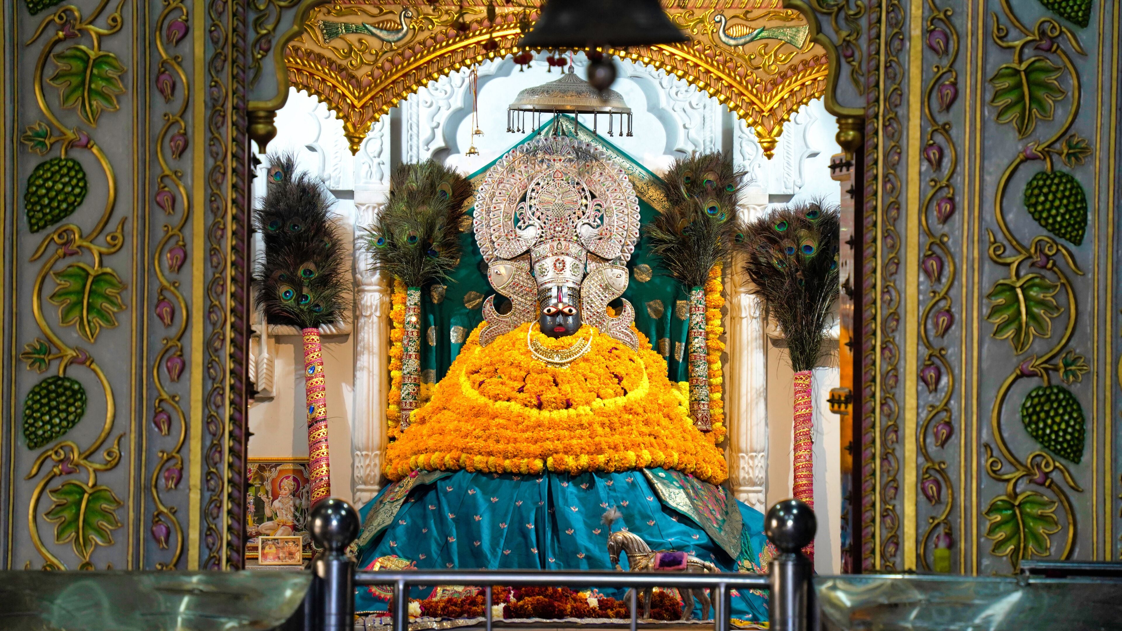 Lord Khatu Shyam ji Baba, form of Lord Krishna decorated with colorful garlands in Khatu. Shyam is a name and manifestation of Barbareek, grandson of Bhim and Hidimba in Mahabharata.