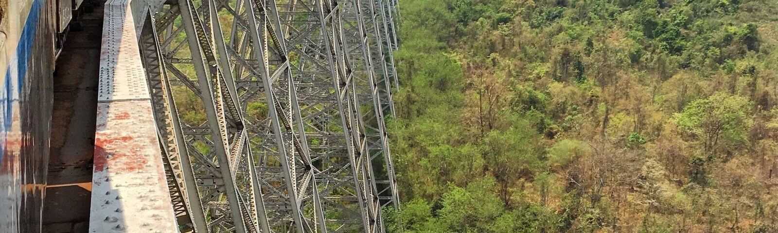 Take the train from Mandalay to Hsipaw and experience this bridge, finished in 1900 by the British. Amazing view and scenery! Go for upper class, it doesn't cost you much, but the big seats are better to sit in for 12 hours than the wooden benches.. You get to meet lots of locals on the way, when the train stops for approximately 20 minutes several times!