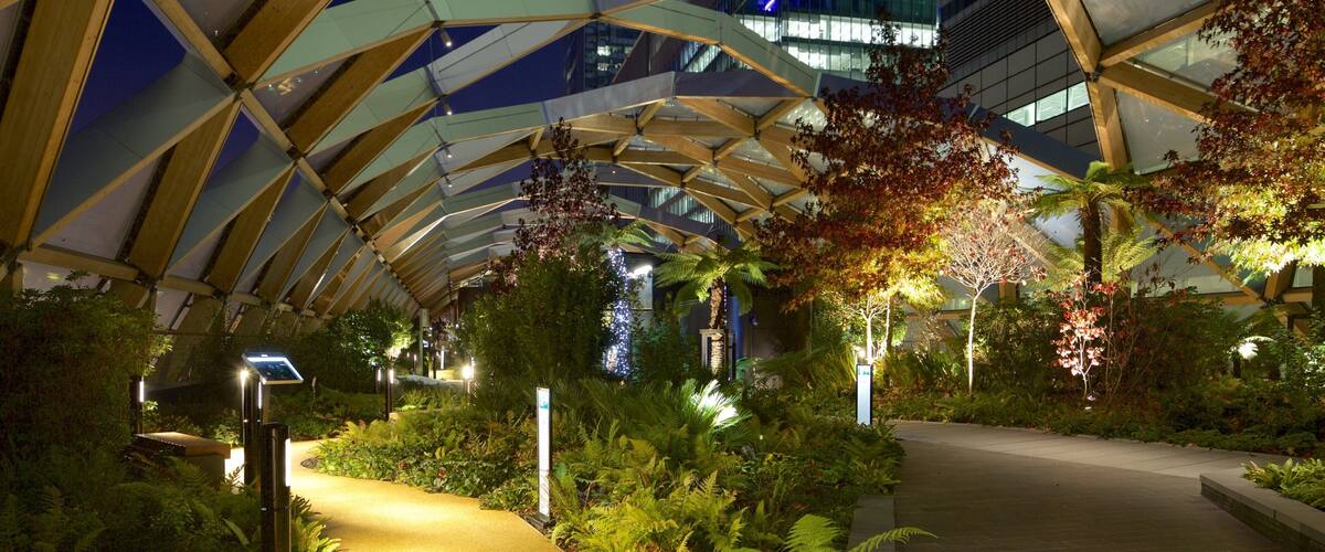 Canary Wharf which includes a park, interior views and night scenes