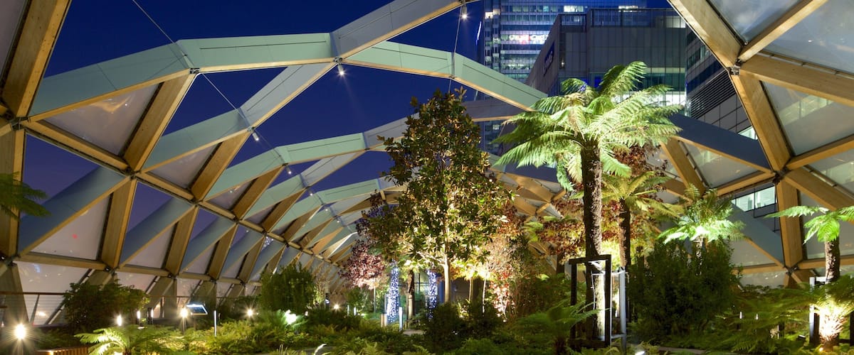 Canary Wharf which includes night scenes, interior views and a park