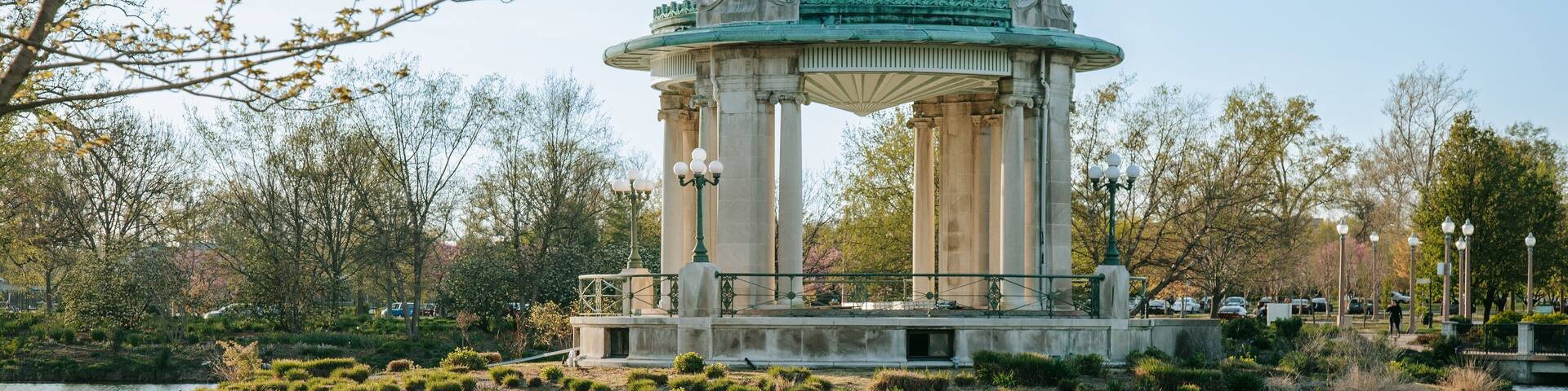 Pagoda Circle featuring heritage elements, a pond and bird life