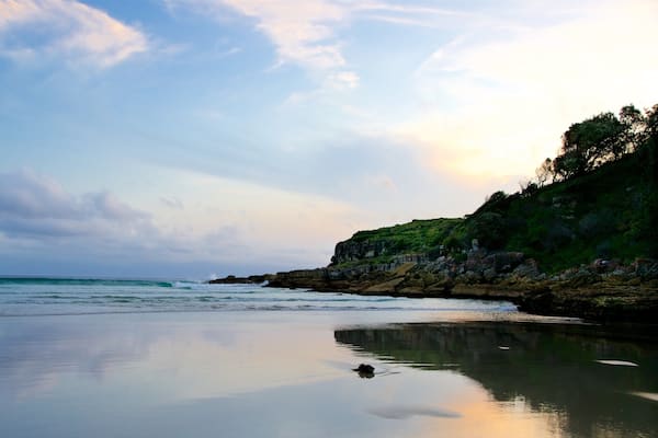 Caves Beach showing general coastal views and a sunset
