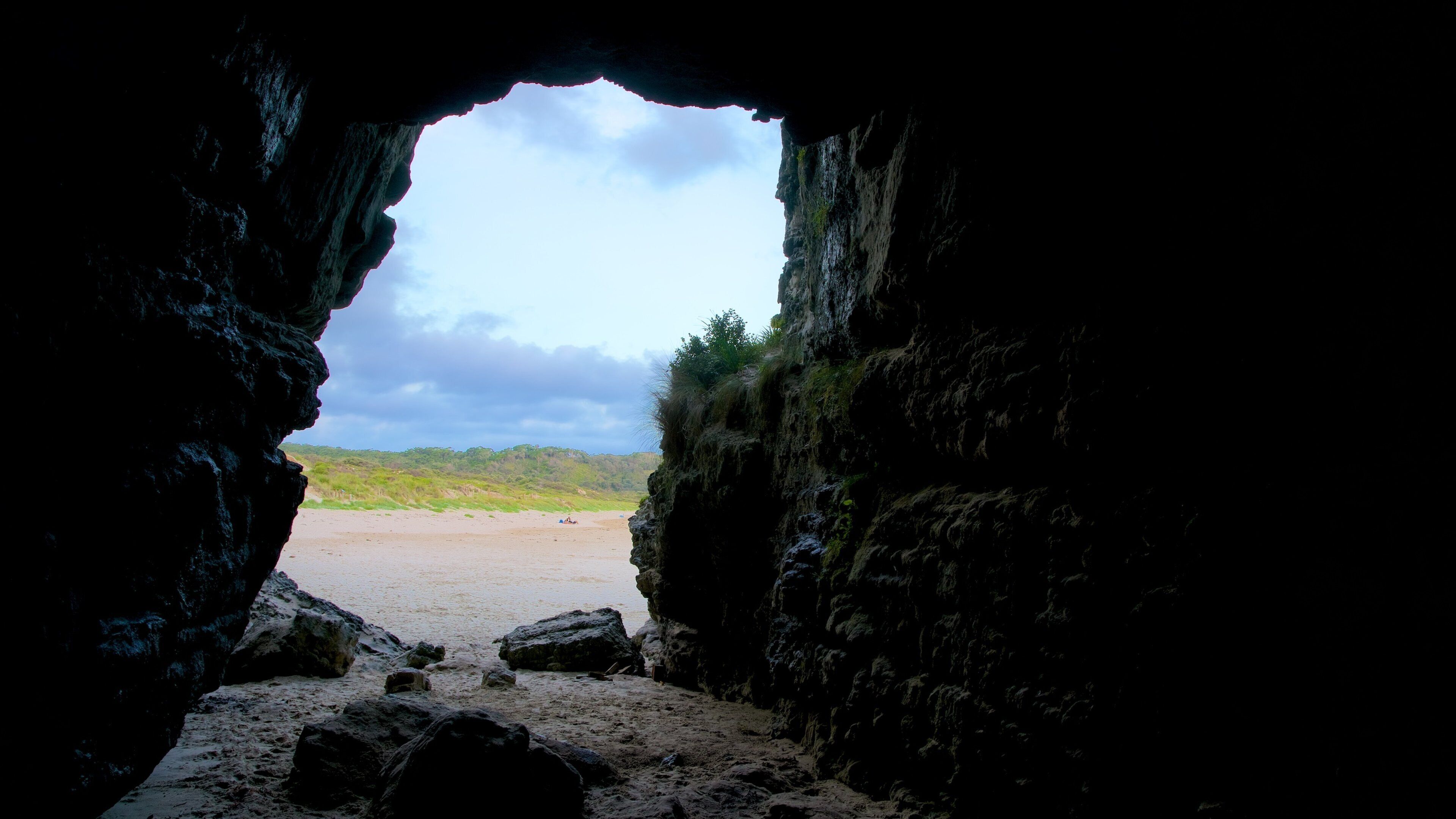 Sanctuary Point featuring interior views, caves and a sandy beach
