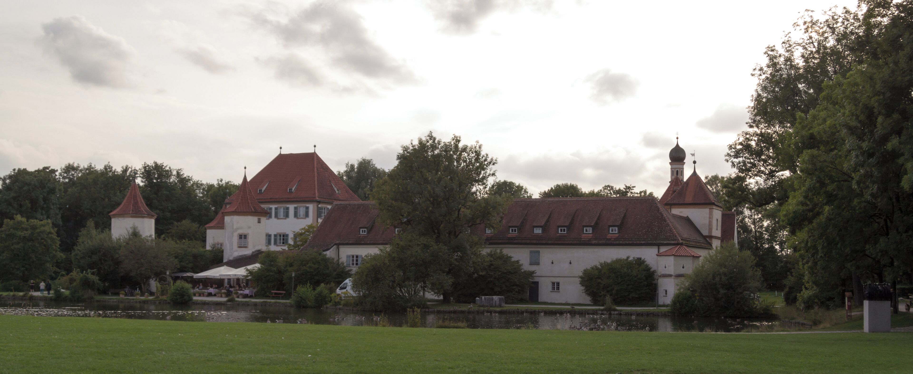 Panorama view to Schloss Blutenburg on a warm summer evening.