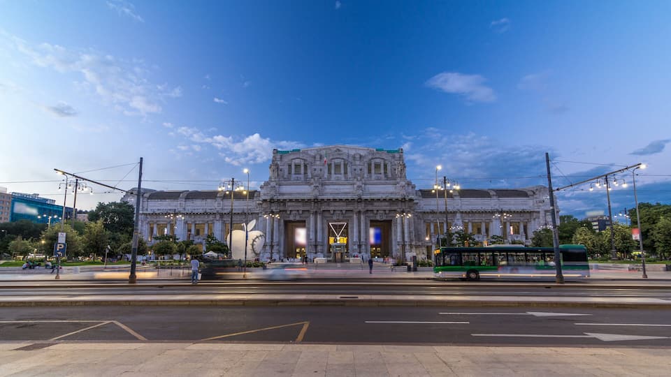 Milano Centrale day to night timelapse in Piazza Duca d'Aosta is the main railway station of the city of Milan in Italy.