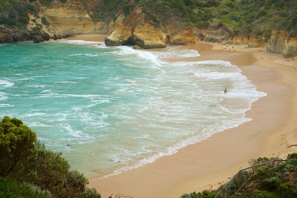 Childers Cove which includes general coastal views and a beach