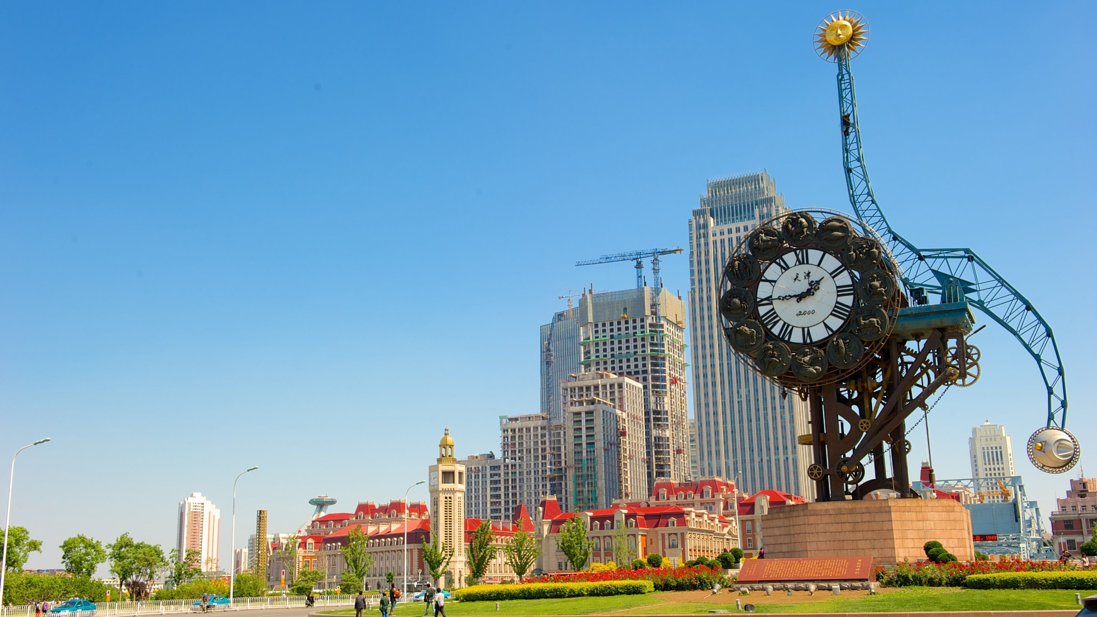 Tianjin which includes outdoor art, a square or plaza and a city