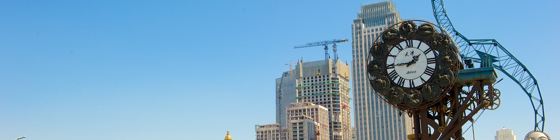 Tianjin which includes outdoor art, a square or plaza and a city