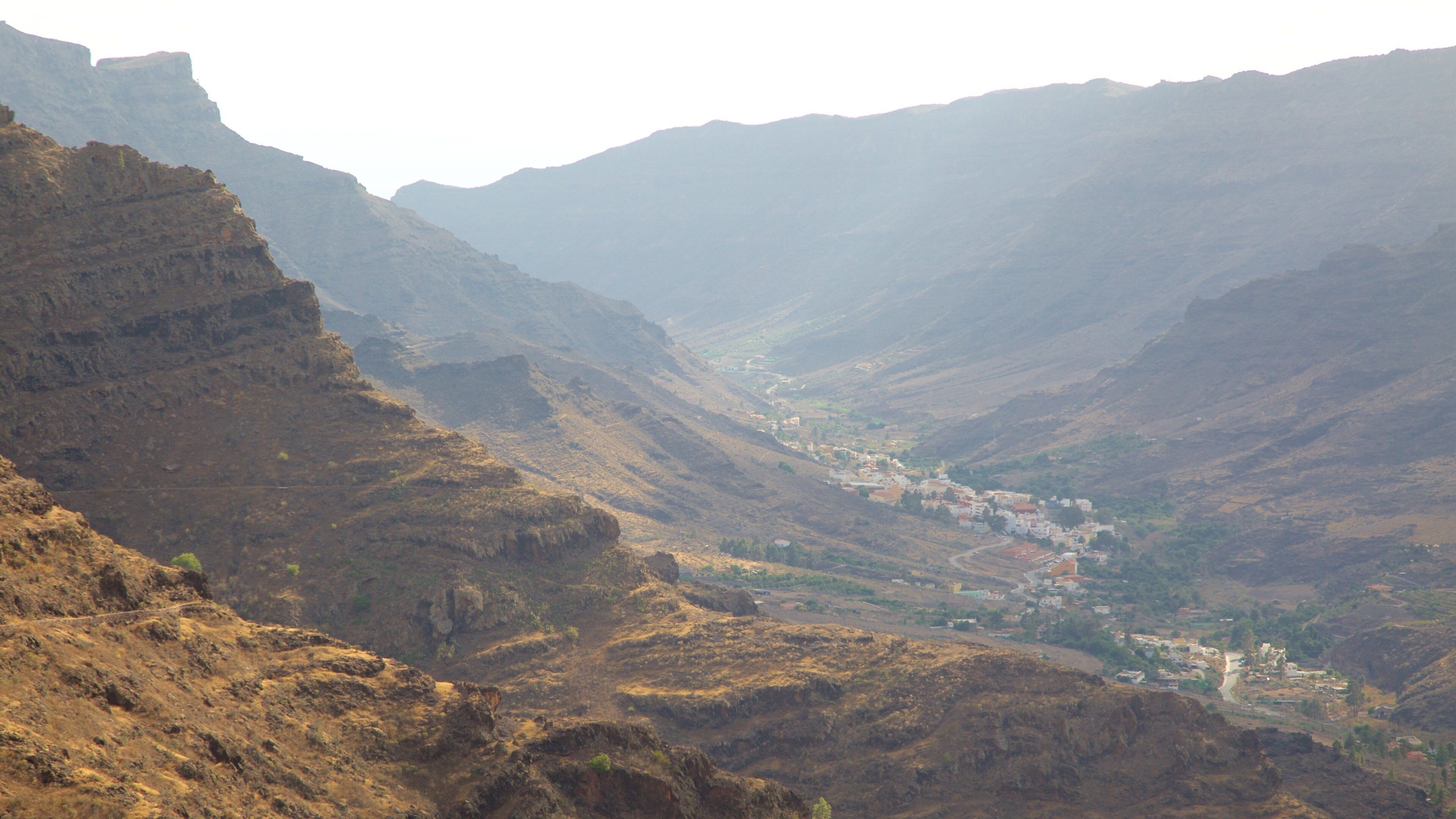 Gran Canaria showing a gorge or canyon and a small town or village