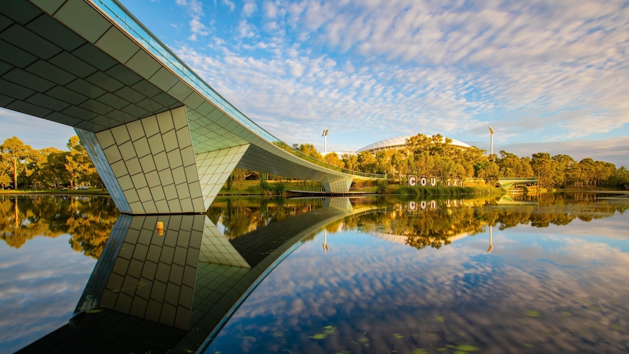 River Torrens Footbridge which includes a river or creek, a sunset and a bridge