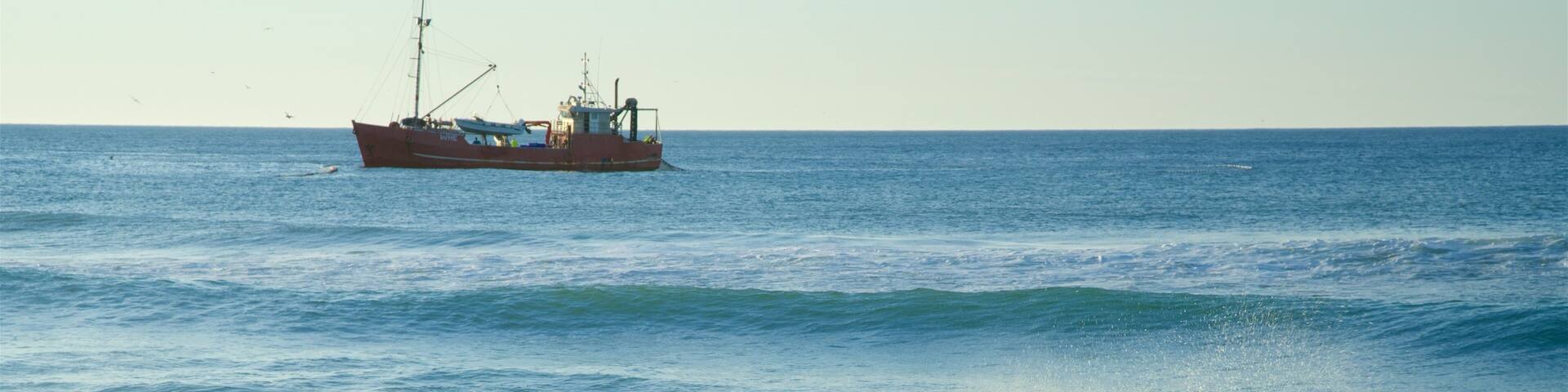 Gippsland featuring a bay or harbor, boating and waves