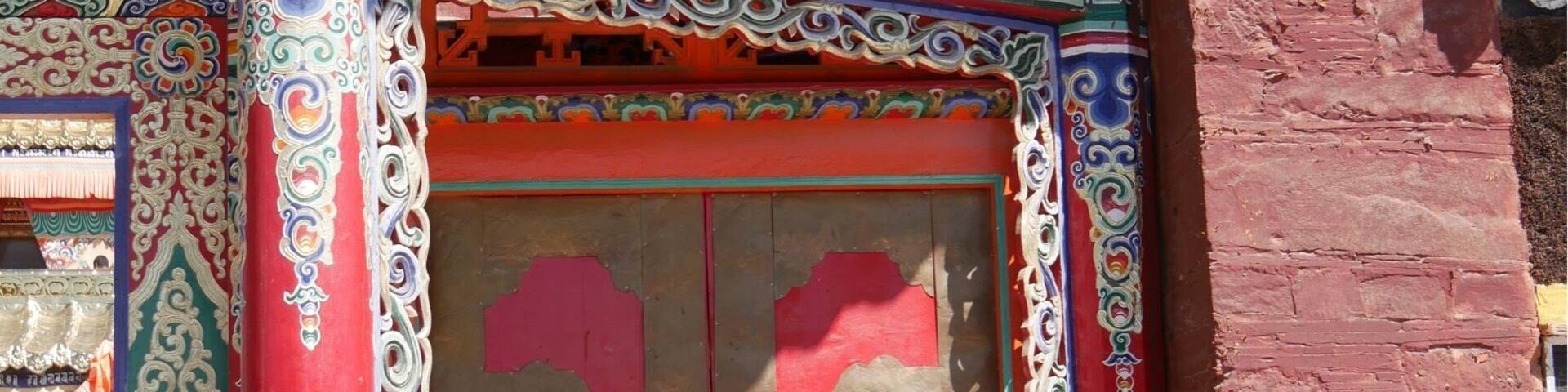 Entrance to Milarepa Palace/Pavilion/Temple about 10 km outside of Xiahe, China. Originally built in the 1100s by the Tibetan Buddhist philosopher Milarepa. Mostly destroyed in the Cultural Revolution and now rebuilt.