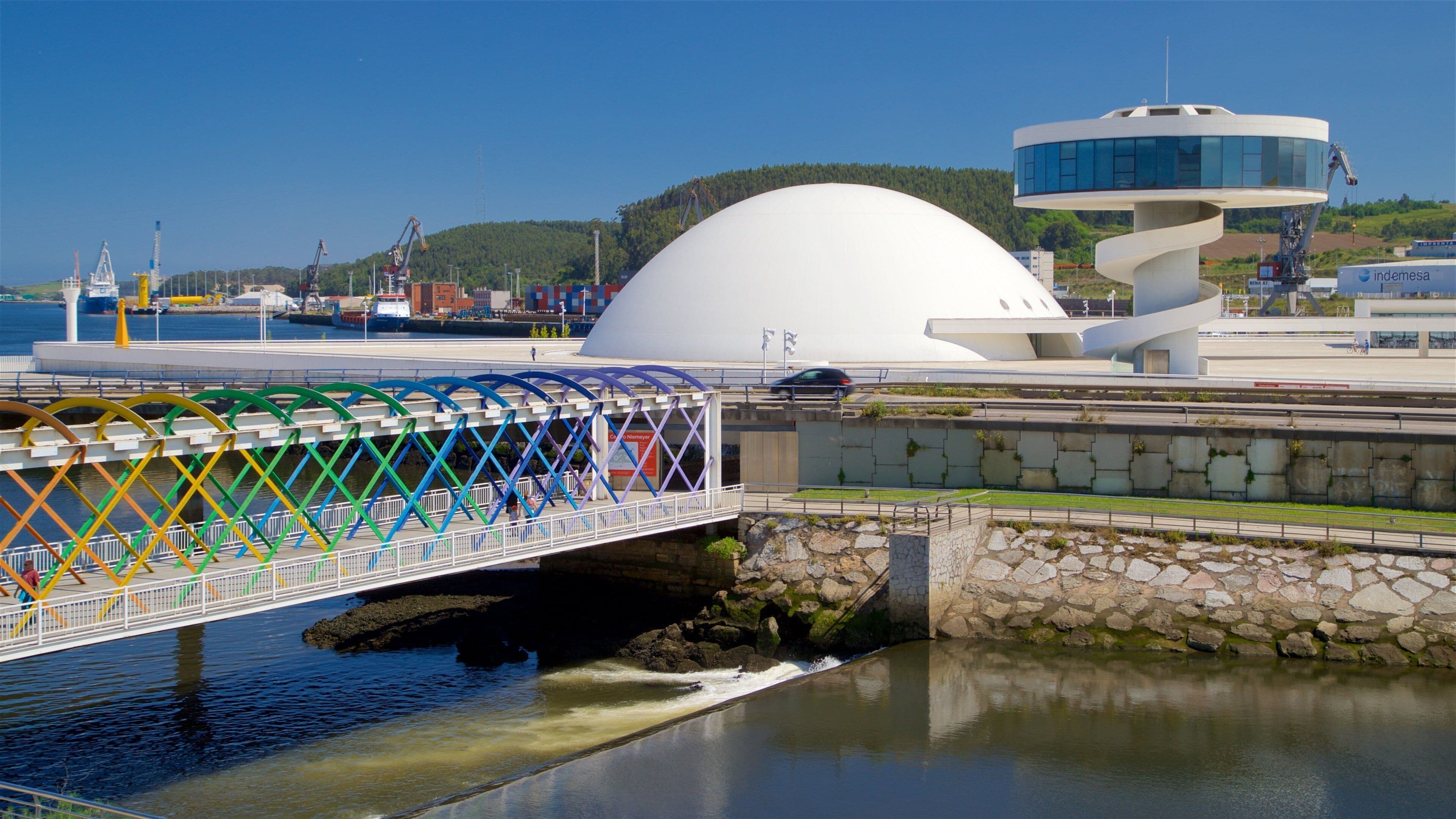 Aviles showing a bridge, modern architecture and a river or creek