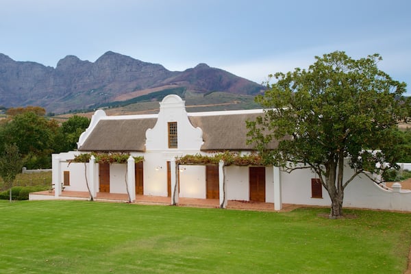 Babylonstoren which includes mountains, a small town or village and landscape views
