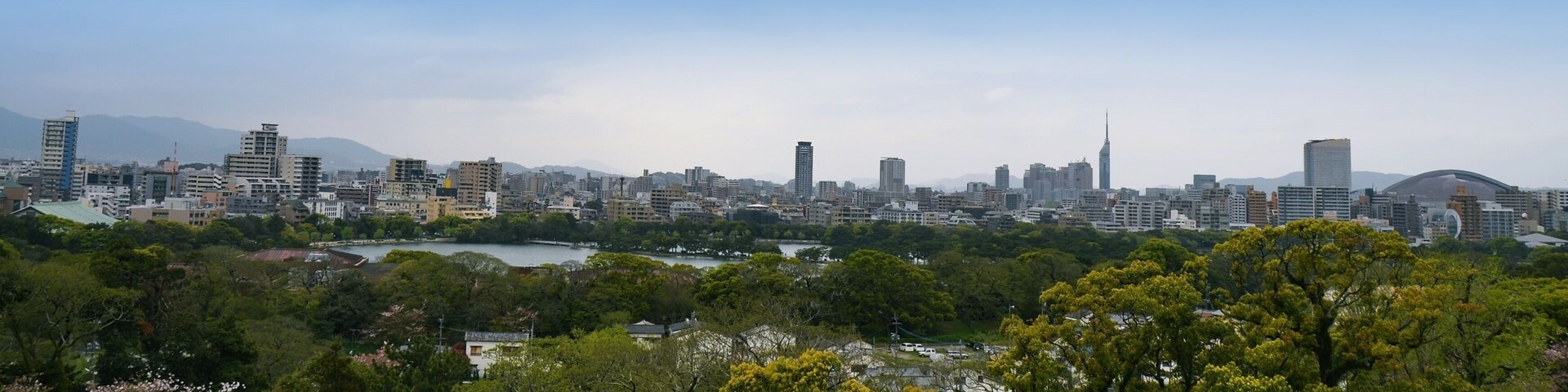 View from the ruins of Maizuru castle: Ohori park and Fukuoka skyline. Fukuoka city, Japan. 04-07-2015