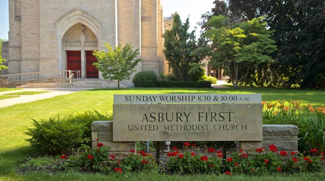 Asbury First United Methodist Church featuring a church or cathedral, heritage architecture and signage