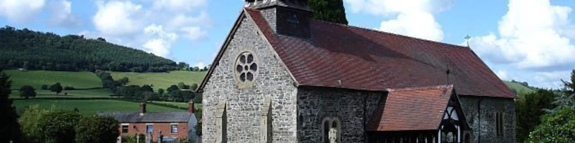 St Garmon's, Llanfechain A 12th century church in a nearly circular churchyard in the centre of the village.