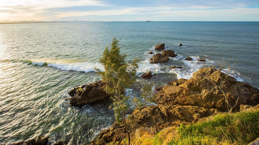 St Maarten and St Martin featuring general coastal views, rugged coastline and a sunset