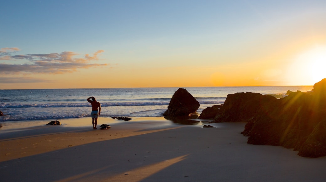 The Pass showing general coastal views, a sunset and a beach