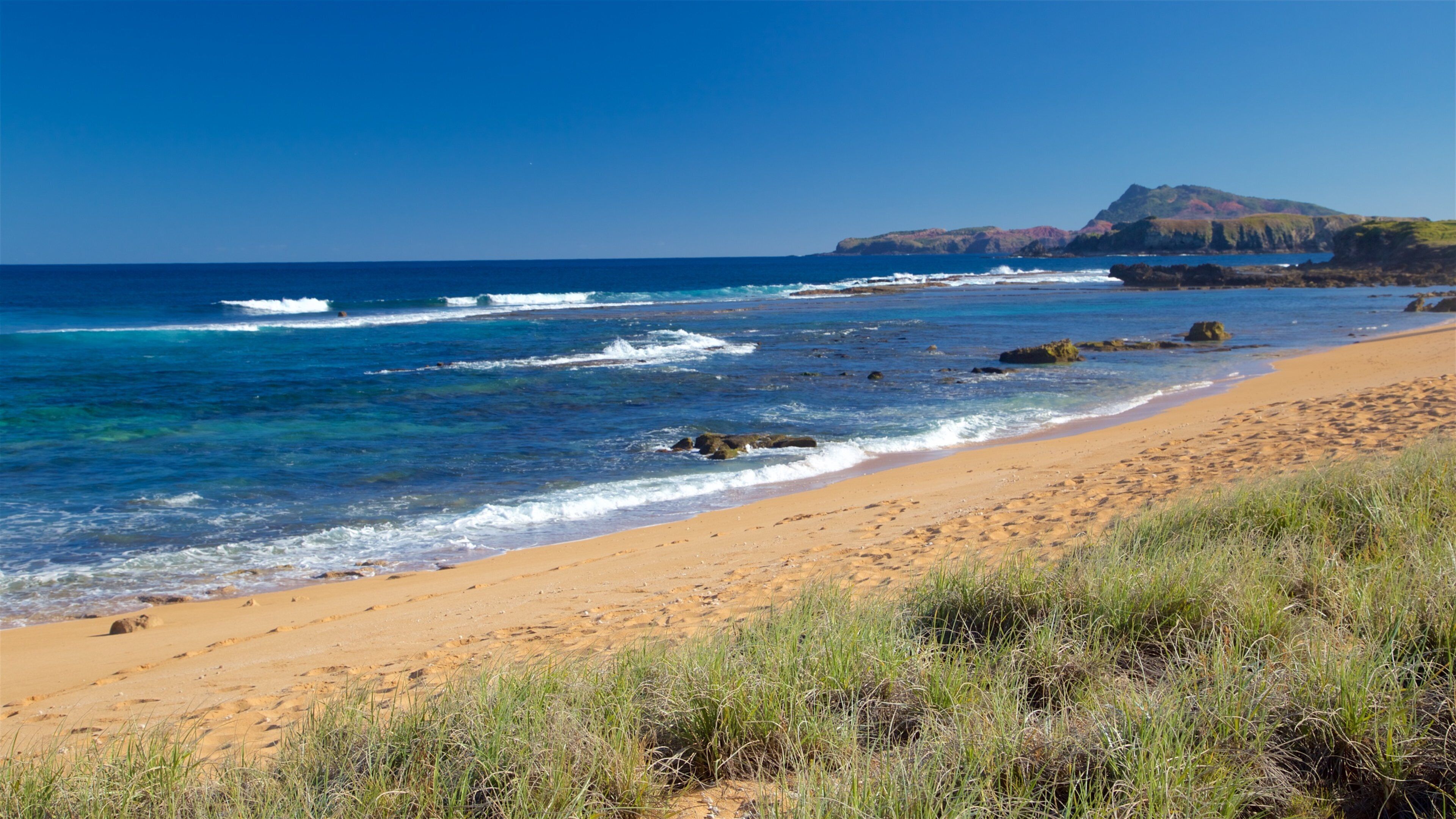 Norfolk Island showing a beach and general coastal views