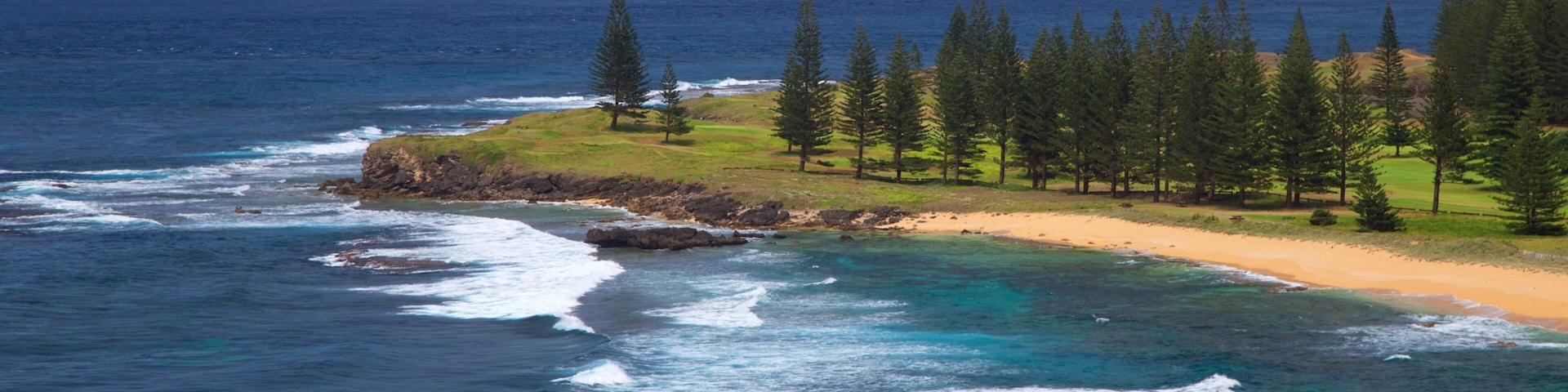 Ilha Norfolk caracterizando uma praia de areia e paisagens litorâneas