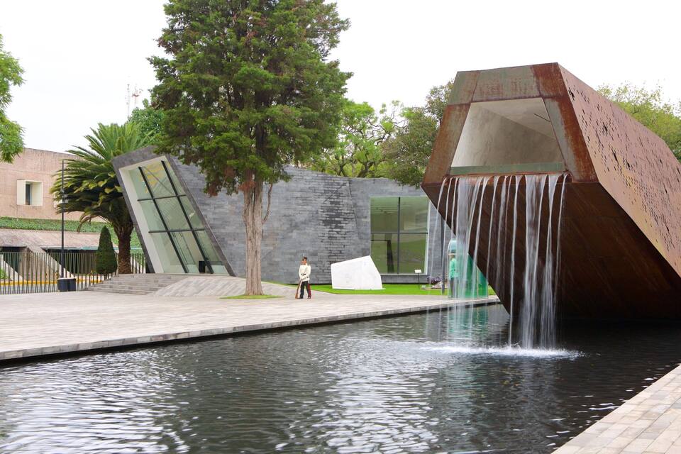 A modern building with a waterfall feature.