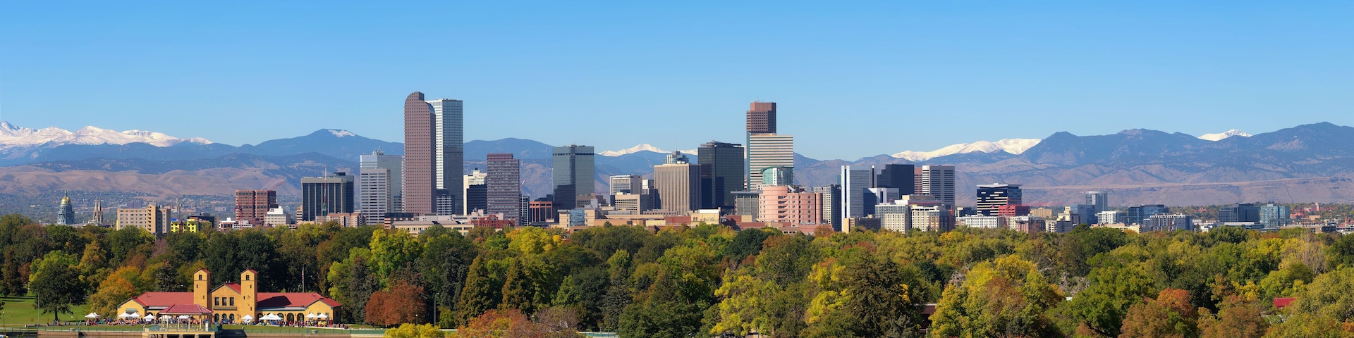 Skyline of Denver downtown with Rocky Mountains