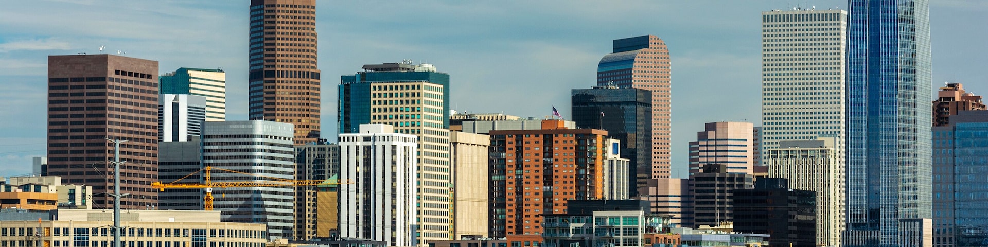 Downtown Denver, Colorado Skyscrapers with Confluence Park and the Speer Blvd. Platte River Bridges in the Foreground