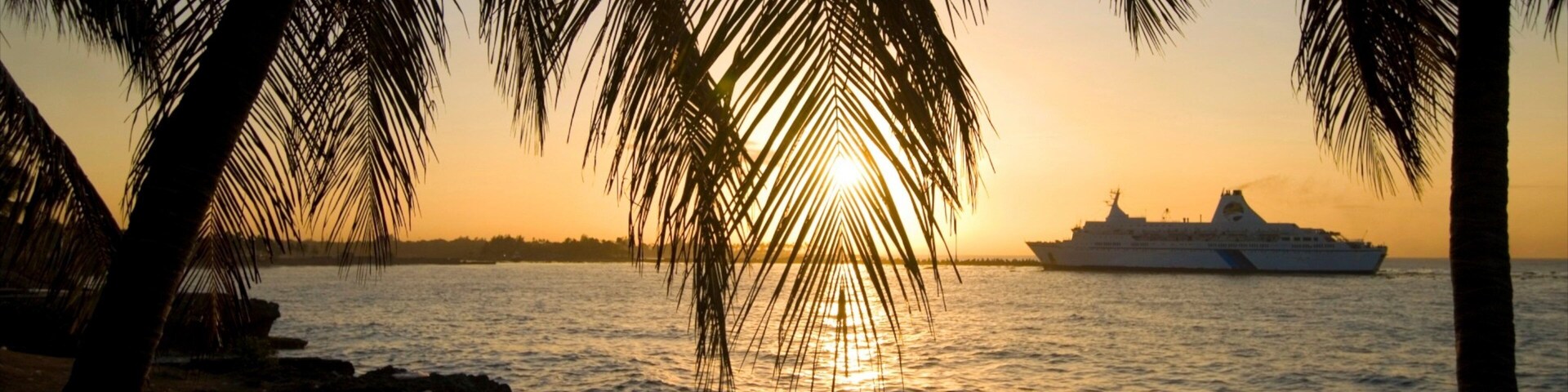 República Dominicana mostrando un atardecer, vistas de una costa y escenas tropicales