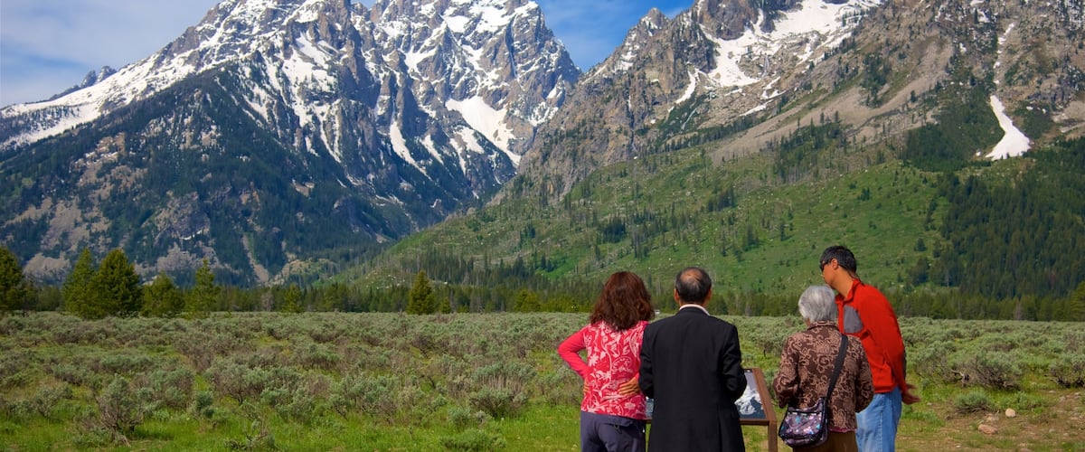 Grand Teton National Park which includes tranquil scenes and mountains as well as a small group of people