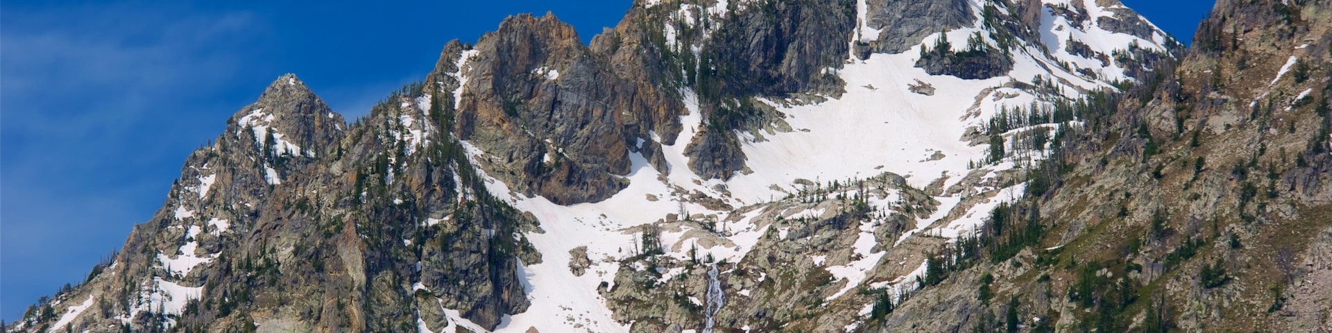 Grand Teton National Park que inclui montanhas e neve