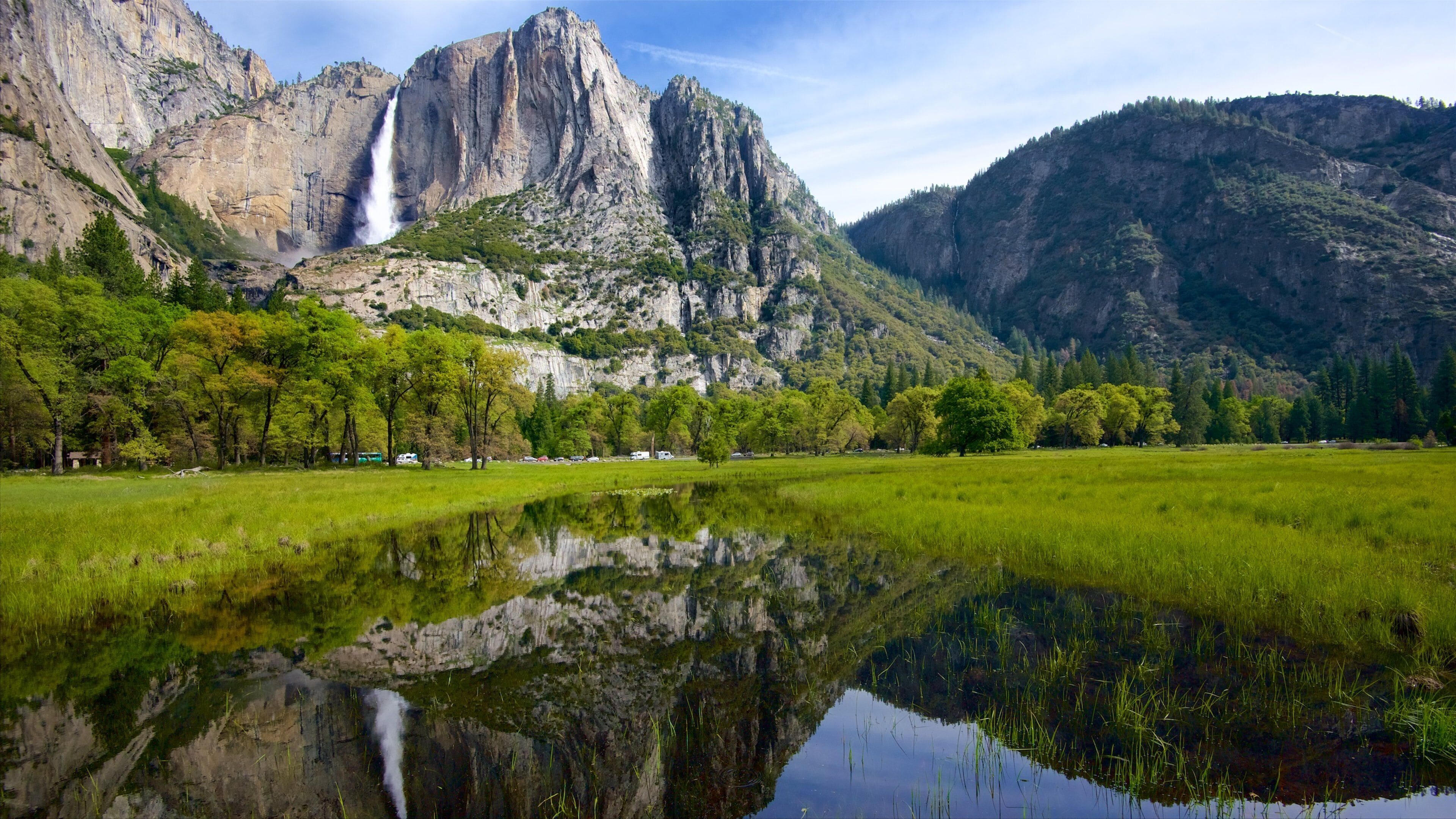 Yosemite National Park which includes a lake or waterhole, mountains and tranquil scenes