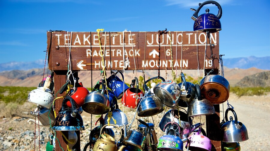 Death Valley featuring signage, heritage elements and desert views