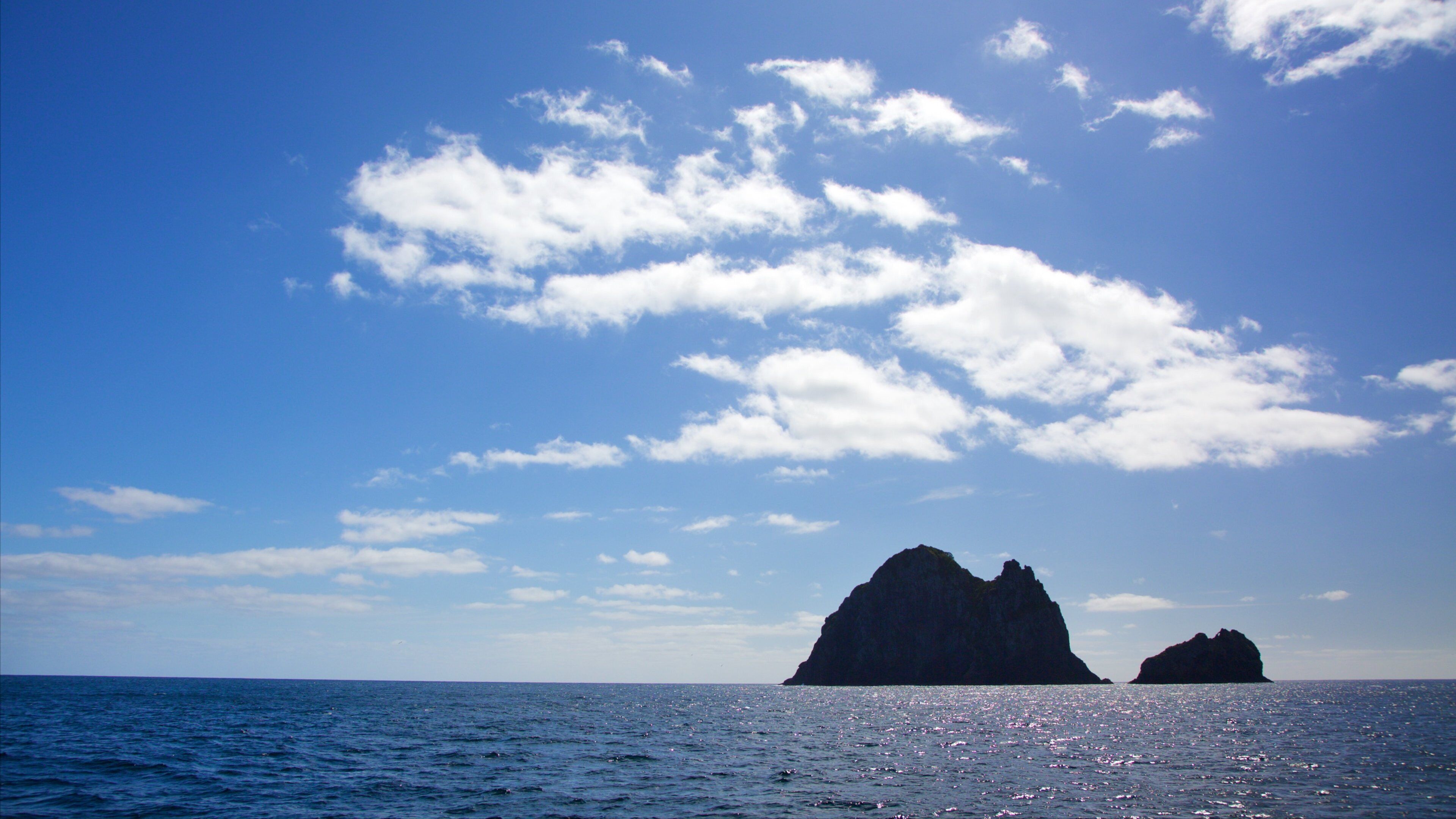 Hole In The Rock featuring island views and a bay or harbor