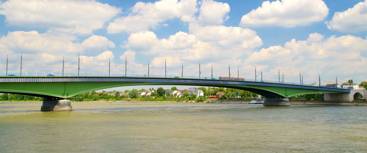 Kennedy Bridge featuring a bridge and a river or creek